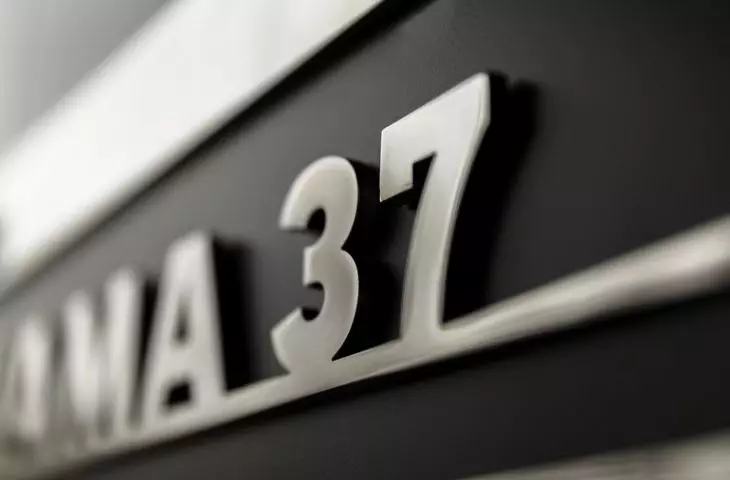 Lamp with tenement number.