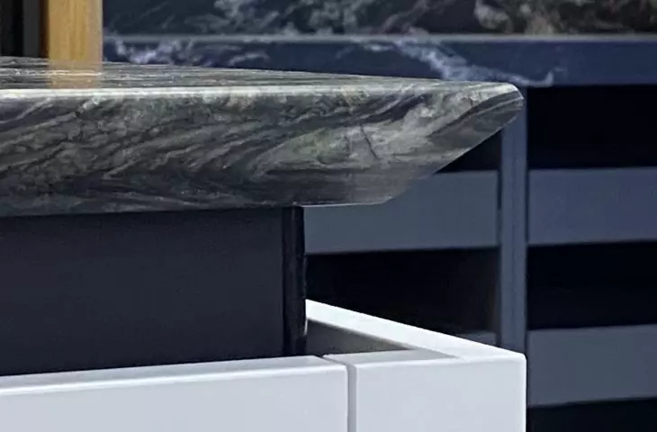 Stone countertop with shark nose undercut