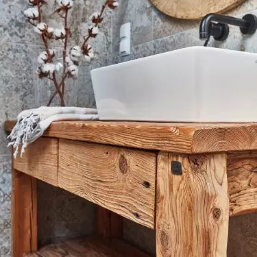 Bathroom console made of aged wood with original preserved old hand-hewn surface