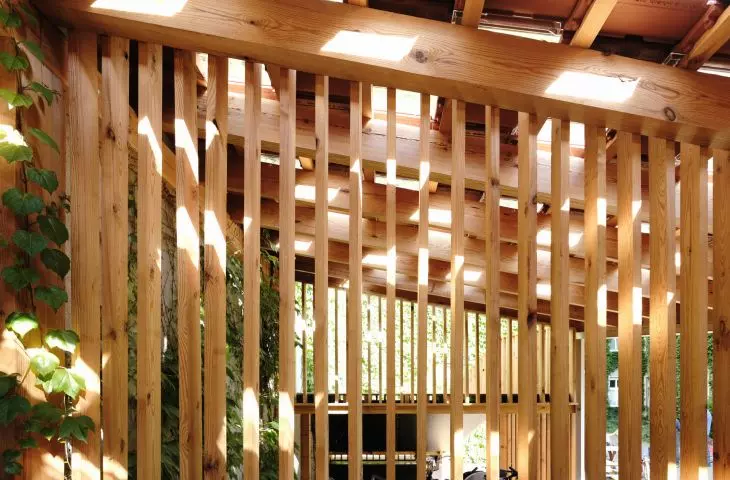 The body is formed by openwork walls of vertically arranged larch boards