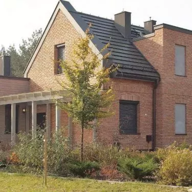 Facade of the building made of Italian hand-formed bricks