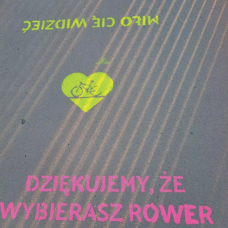 Bike path with fluorescent lettering