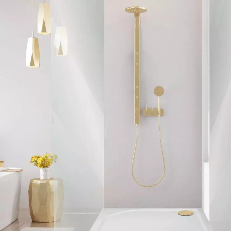 Shower tray drain with cover in precious gold color
