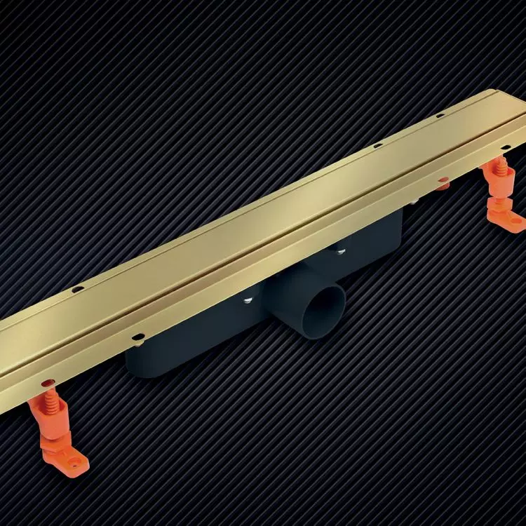 Shower tray drain with cover in precious gold color