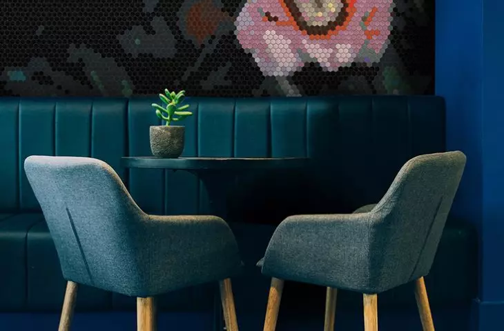 Custom mosaic design on the wall in a cafe