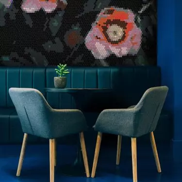 Custom mosaic design on the wall in a cafe