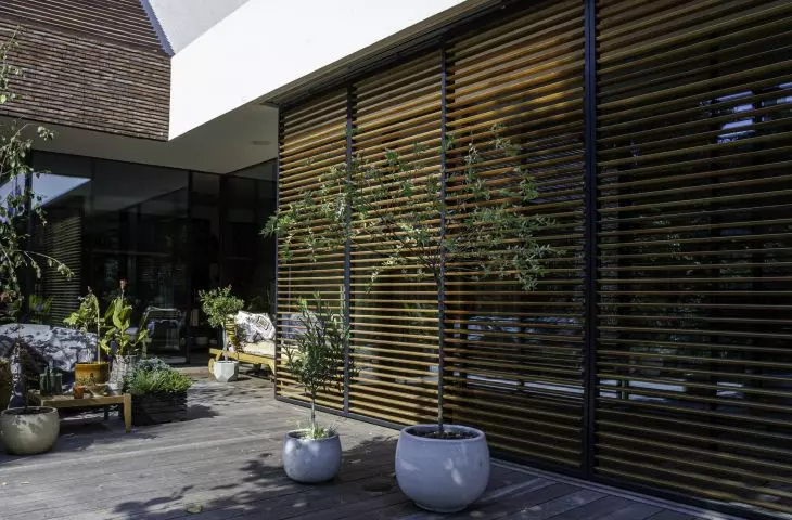 Movable facades: sliding and accordion shutters
