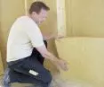 Thermal insulation of voids in partition walls, in frames for an additional layer of insulation or in so-called installation walls