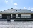 Front fence made of galvanized vertical profiles of 2 cm x 2 cm, on a concrete foundation, RAL 7016 color