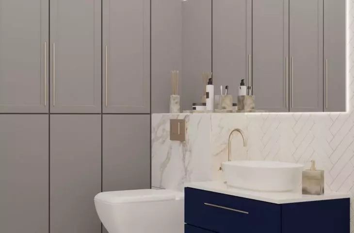 The bathroom next to the owners' bedroom houses a sizable closet, which, in addition to ample storage space, also accommodated a washer and dryer. 