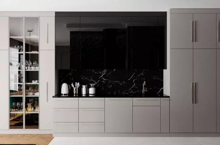 The cooking area is positioned so that it cannot be seen from the lounge area of the room. 
