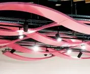 Waving island ceilings from the METAL line by ARMSTRONG dedicated to, among other things, industrial interiors