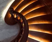 Lighting in a built-in structure mounted just above the steps