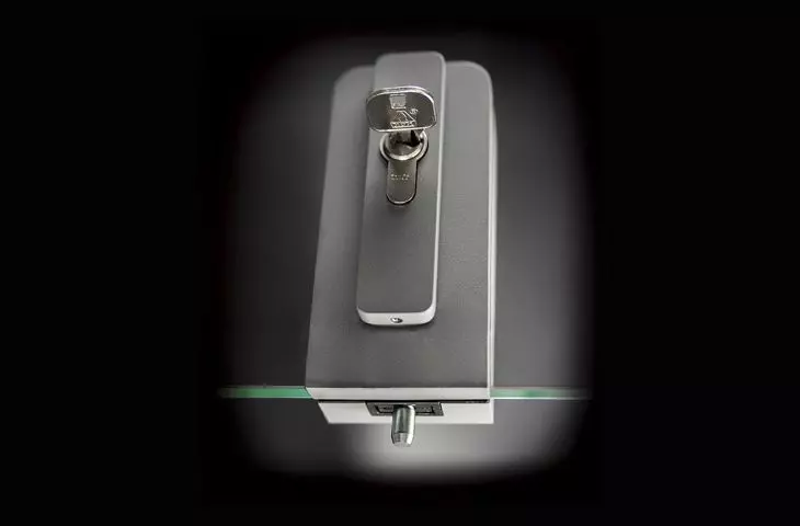Lock for glass panel-floor doors
