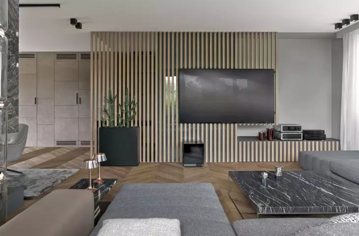 Living room with part of the hall separated by wooden slats