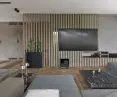 Salon z częścią holu oddzieloną drewnianymi listwami