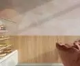 Interior of Zak ice cream shop, wall with pink clouds