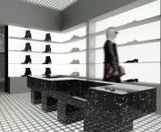 Wnętrze showroomu MISBHV, strefa obuwia, siedzisko inspirowane formami Maxa Lamba