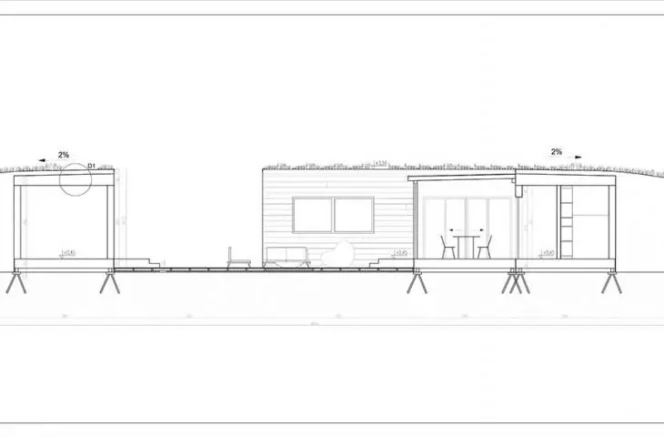 In keeping with the idea of blending into the landscape, the modules on the sides, along with retaining walls, were backfilled with earth, covered with green roofs.