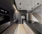 Interior of BAR_21, kitchen and stairs to the floor