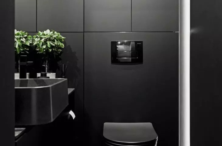 Interior of BAR_21, black toilet on the first floor
