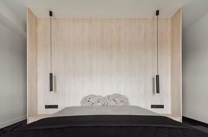 Wooden bed cover goes into the wall