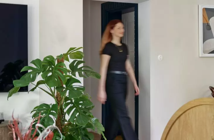 golden arch over the entrance to the corridor