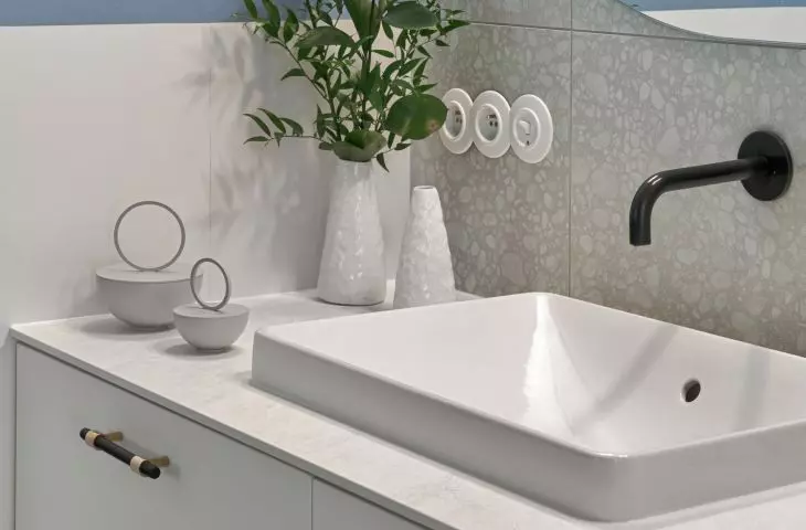 The bathroom is kept in light tones