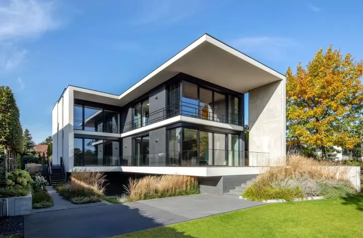 House in the Grouse Park, glazing opens up to the surroundings