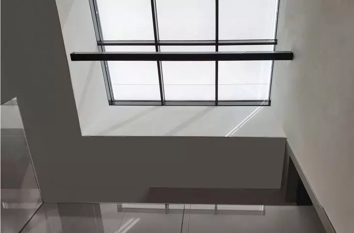 House in the Grouse Park, interior illuminated by skylight 