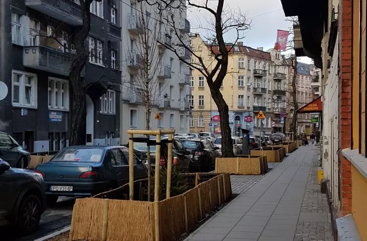 Małeckiego Street at Rynek Łazarski in Poznań - after parking has been cleaned up and greened