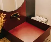 The washbasin is made of steel
