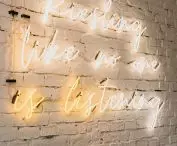 Bistro Grono in Poznan, neon sign on the wall