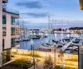 Inwestycja Yacht Park Gdynia. Optymalny komfort wewnątrz budynków zapewniają potrójne szyby zespolone z ciepłą ramką dystansową