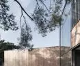 Taras z domem nad jeziorem - proj. UGO Architecture