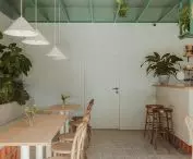 Green ceiling contrasts with white walls
