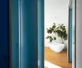 view of bedroom with free-standing bathtub