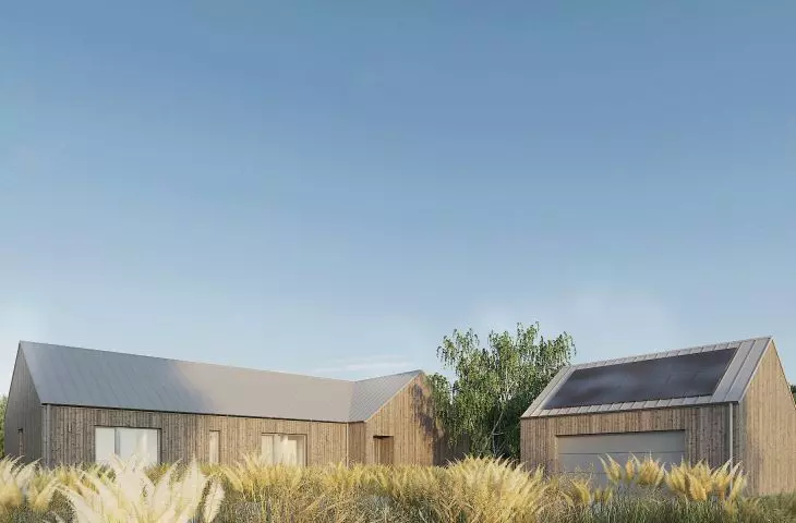 The house fits into a sprawling plot of land surrounded by fields