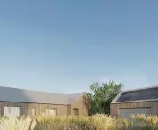 The house fits into a sprawling plot of land surrounded by fields