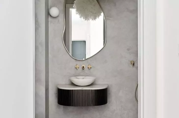 Toilet with a unique mirror