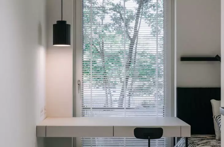 bright bedroom with contrasting color accessories