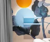Patterned wallpaper in a blue spa space