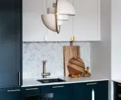 In the kitchen buildings contrast navy blue and white