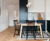 The kitchen is directly connected to the living room