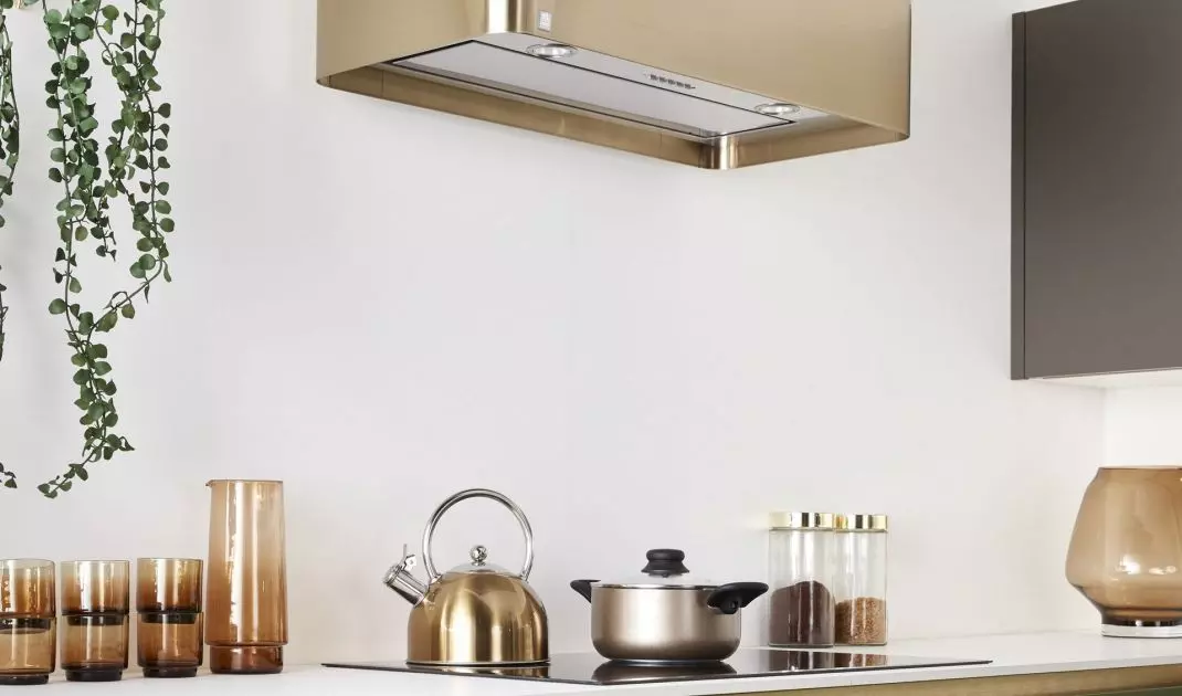 Elegant kitchen hood with a form similar to a cuboid
