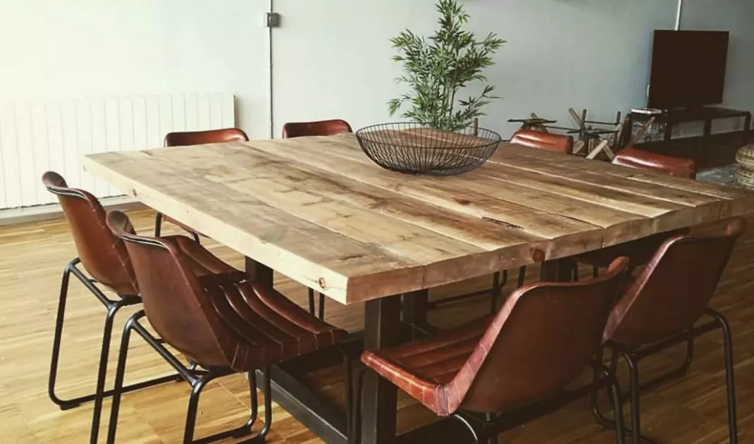 Wooden top on a metal base