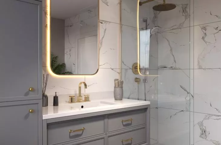 Arranging the collection with gold handles and knobs from the STILO collection