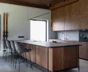 Kitchen, and there are skis leaning against the wall