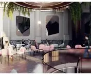 The interior of the cafe refers to the Art Nouveau character of the place