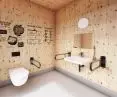 Project Raised Meadow, interior of one of the restrooms. On the walls infographics